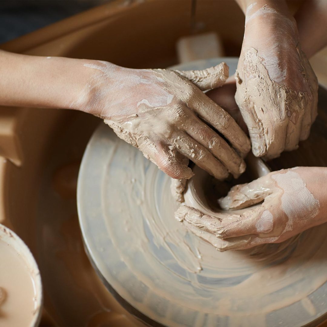 moulding-clay-together-on-pottery-wheel-2021-09-24-03-55-50-utc